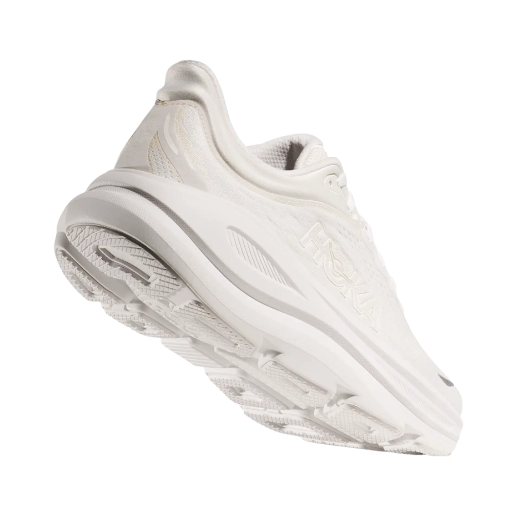 Bottom heel view of the HOKA Men’s Bondi 9 in White/White, highlighting the Durabrasion rubber outsole with high-wear traction zones for durability and reliable grip.