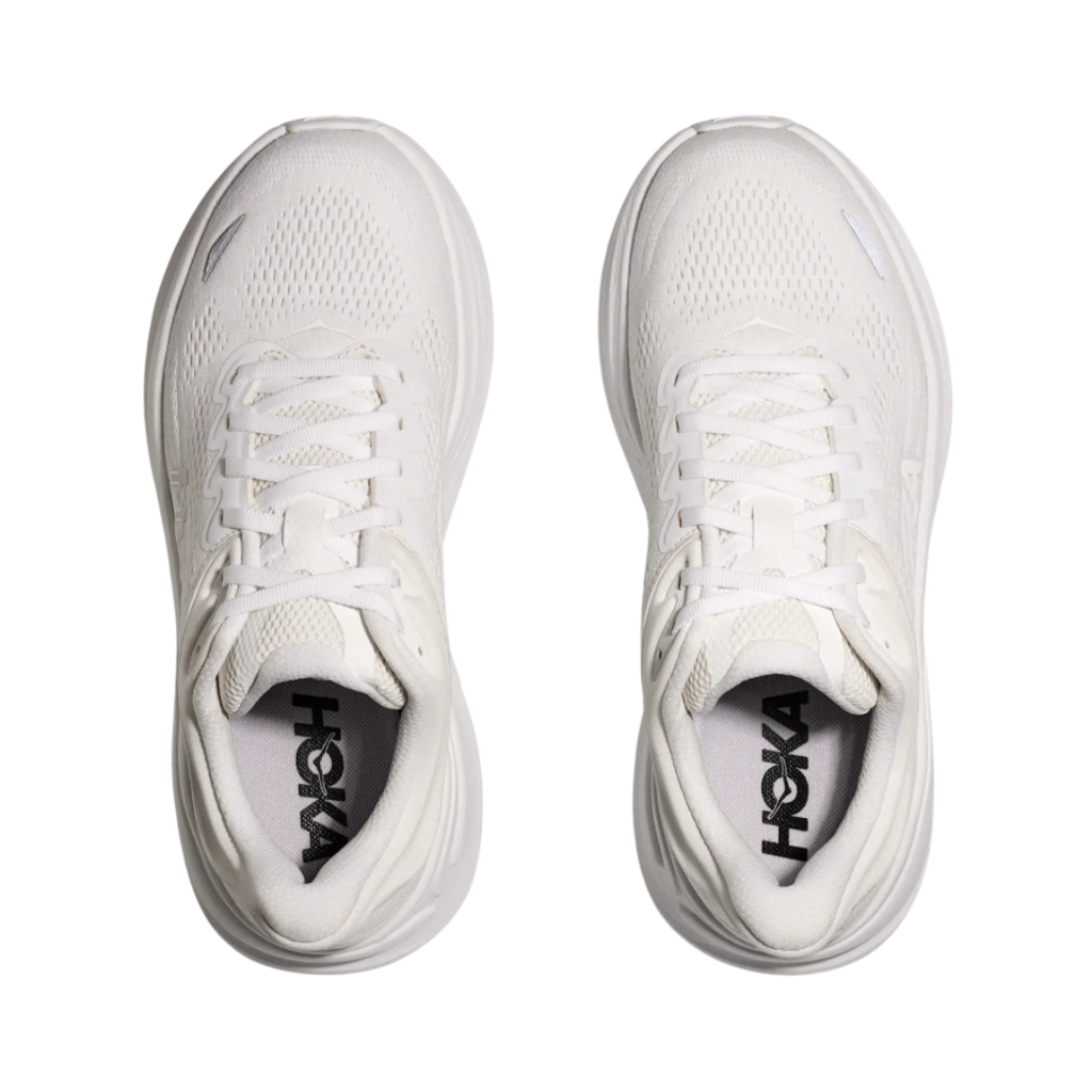 Bottom view of the HOKA Men’s Bondi 9 in White/White, highlighting the Durabrasion rubber outsole with high-wear traction zones for durability and reliable grip.