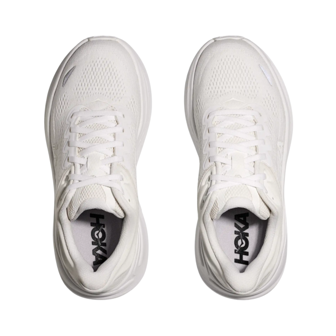 Bottom view of the HOKA Men’s Bondi 9 in White/White, highlighting the Durabrasion rubber outsole with high-wear traction zones for durability and reliable grip.