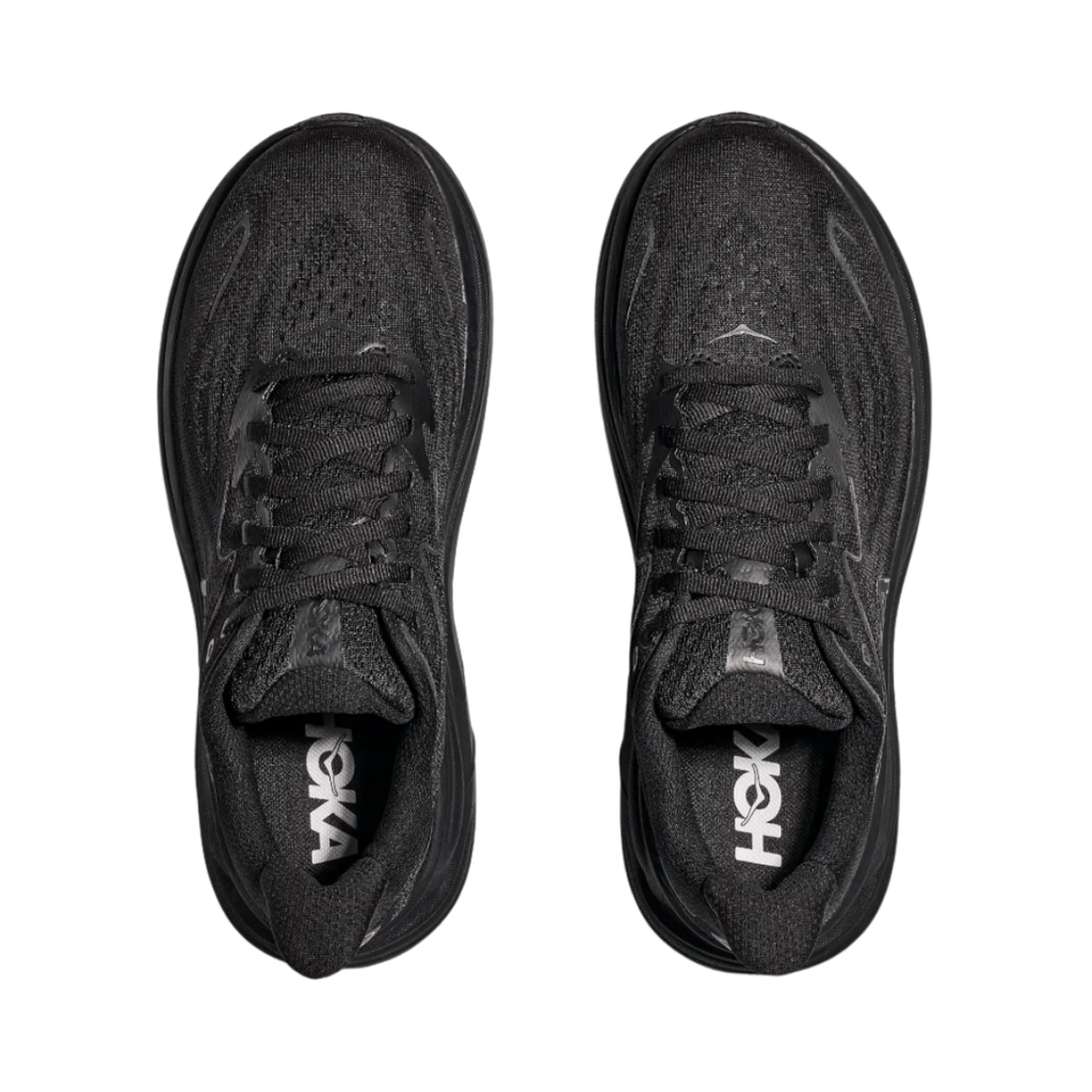 Top view of the HOKA Men’s Clifton 10 in Black/Black, showing the molded EVA sockliner, padded tongue, and double-lace lock system for secure, cushioned all-day comfort.