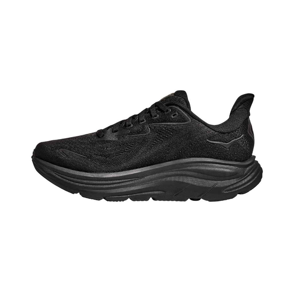 Side view of the HOKA Men’s Clifton 10 in Black/Black, showcasing the lightweight jacquard knit upper, plush CMEVA midsole cushioning, and smooth MetaRocker™ geometry for a soft, efficient ride.
